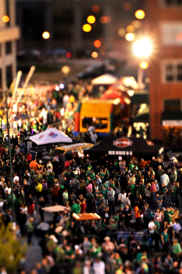 downtown wichita falls festival with crowds of people at night 