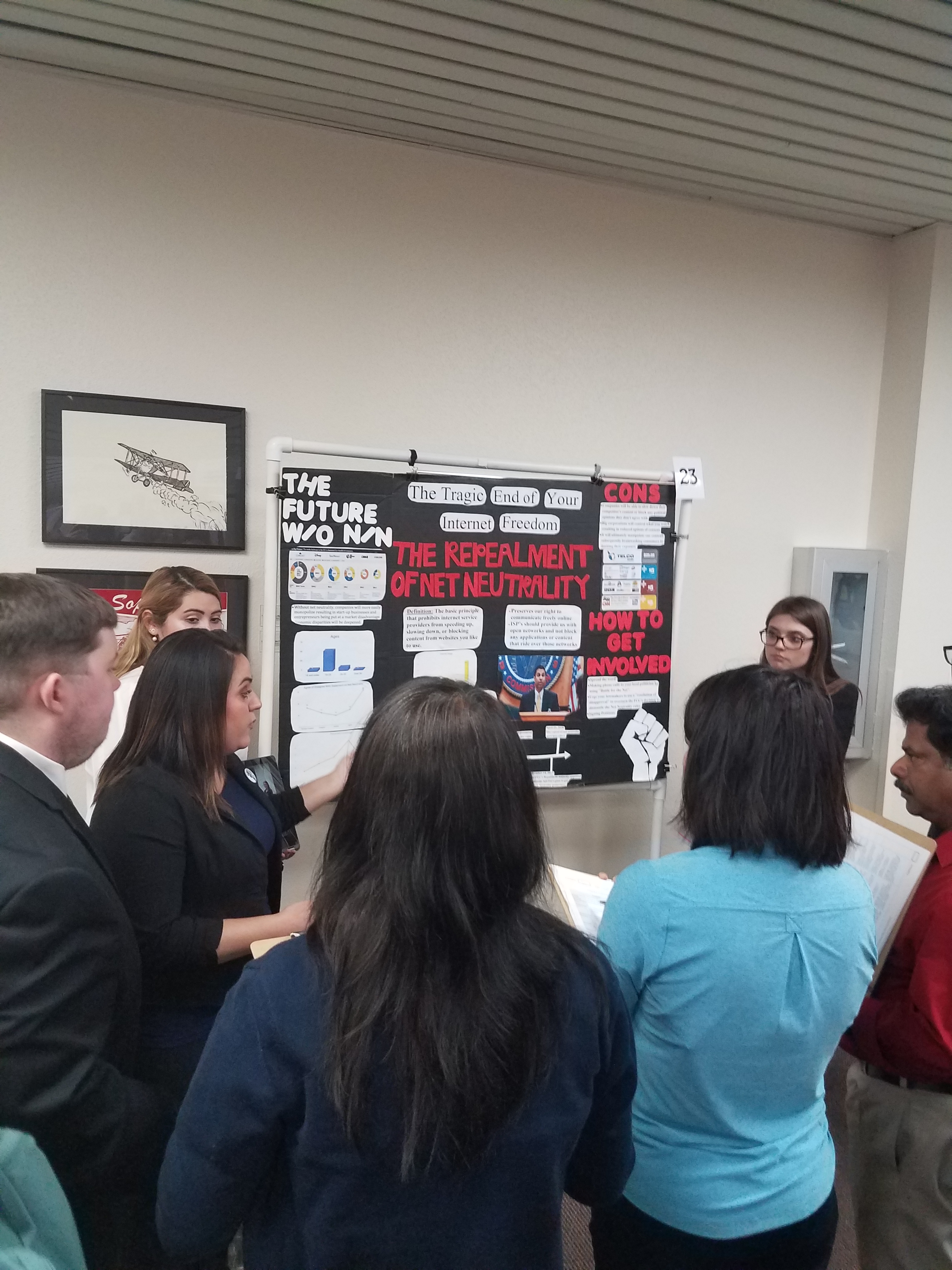 Dillard College of Business students presenting their Net Neutrality undergraduate research at the spring 2018 Celebration of Scholarship.