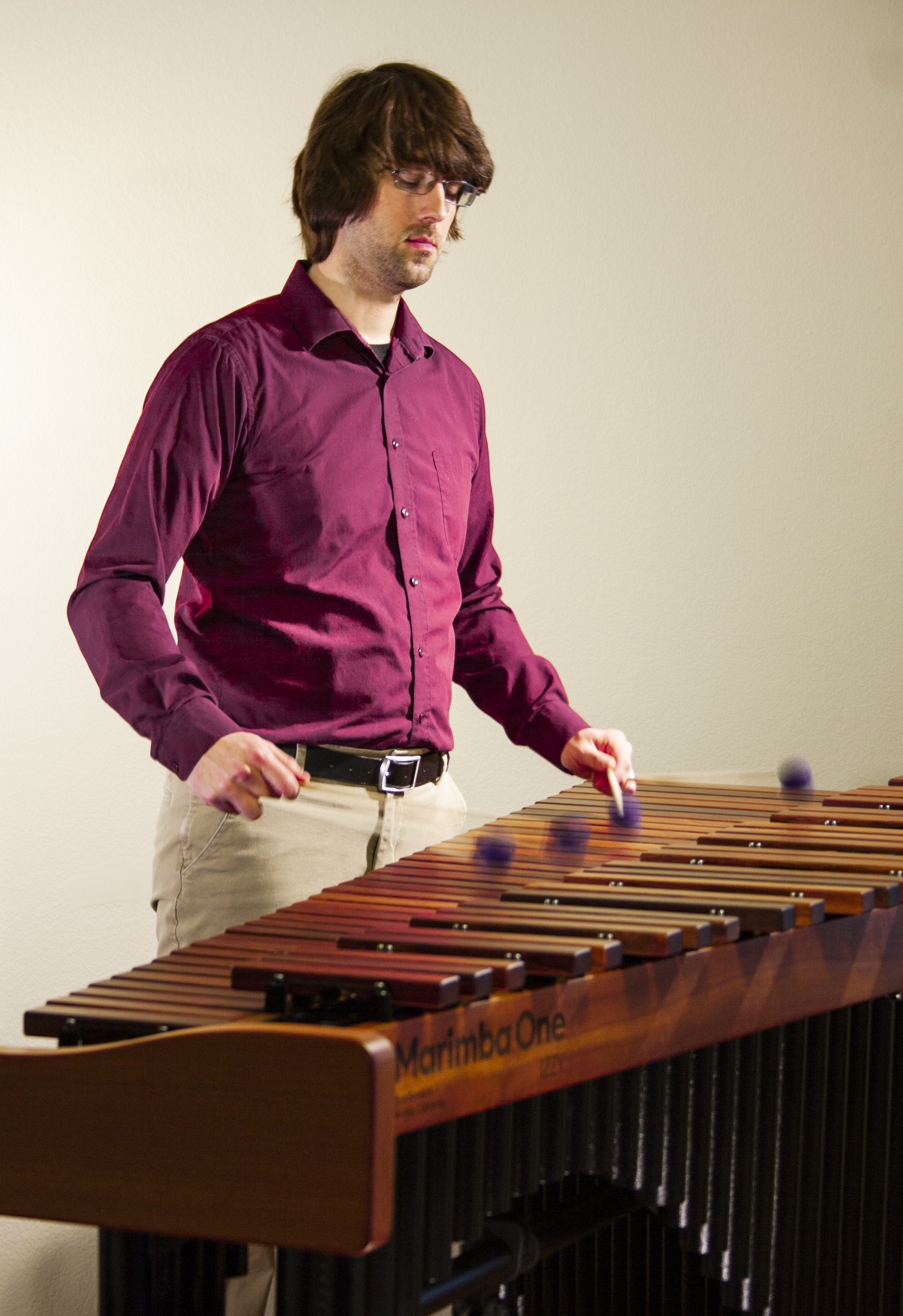 Dr. Robinson playing a marimba.