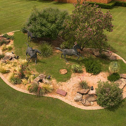 Aerial view of the Believers Statue located on the south side of D.L. Ligon Coliseum.