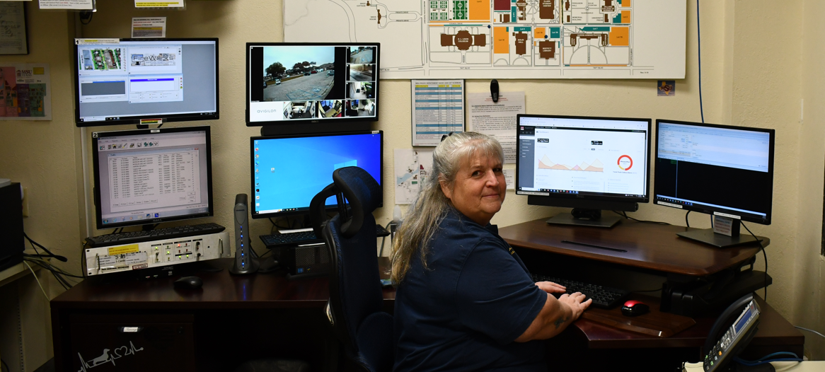 Women working in police station office