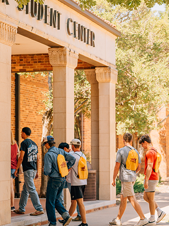 Group of students walking into Clark Student Center.