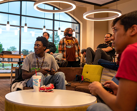 A group of students play games in Legacy Hall during Finals Frenzy.